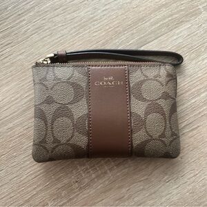 Coach Corner Zip Wristlet In Signature Canvas